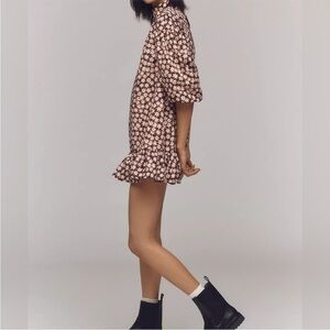 Anthropologie Mock-Neck Swing Mini Dress in a brown and black star print XS